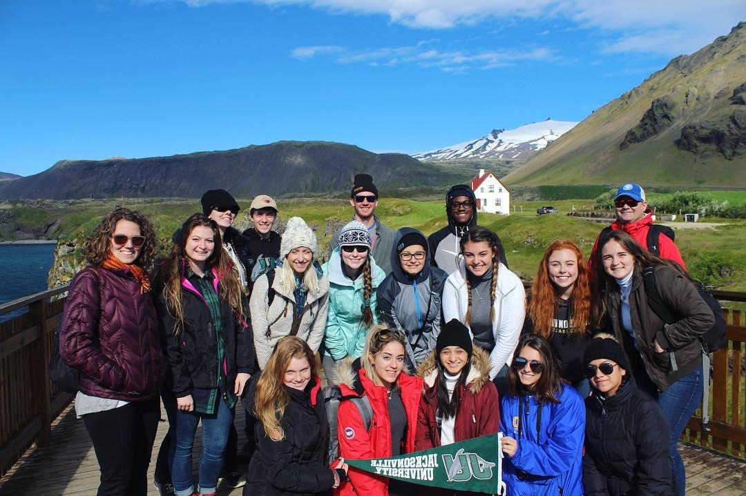 Group trip photo of students and teacher 